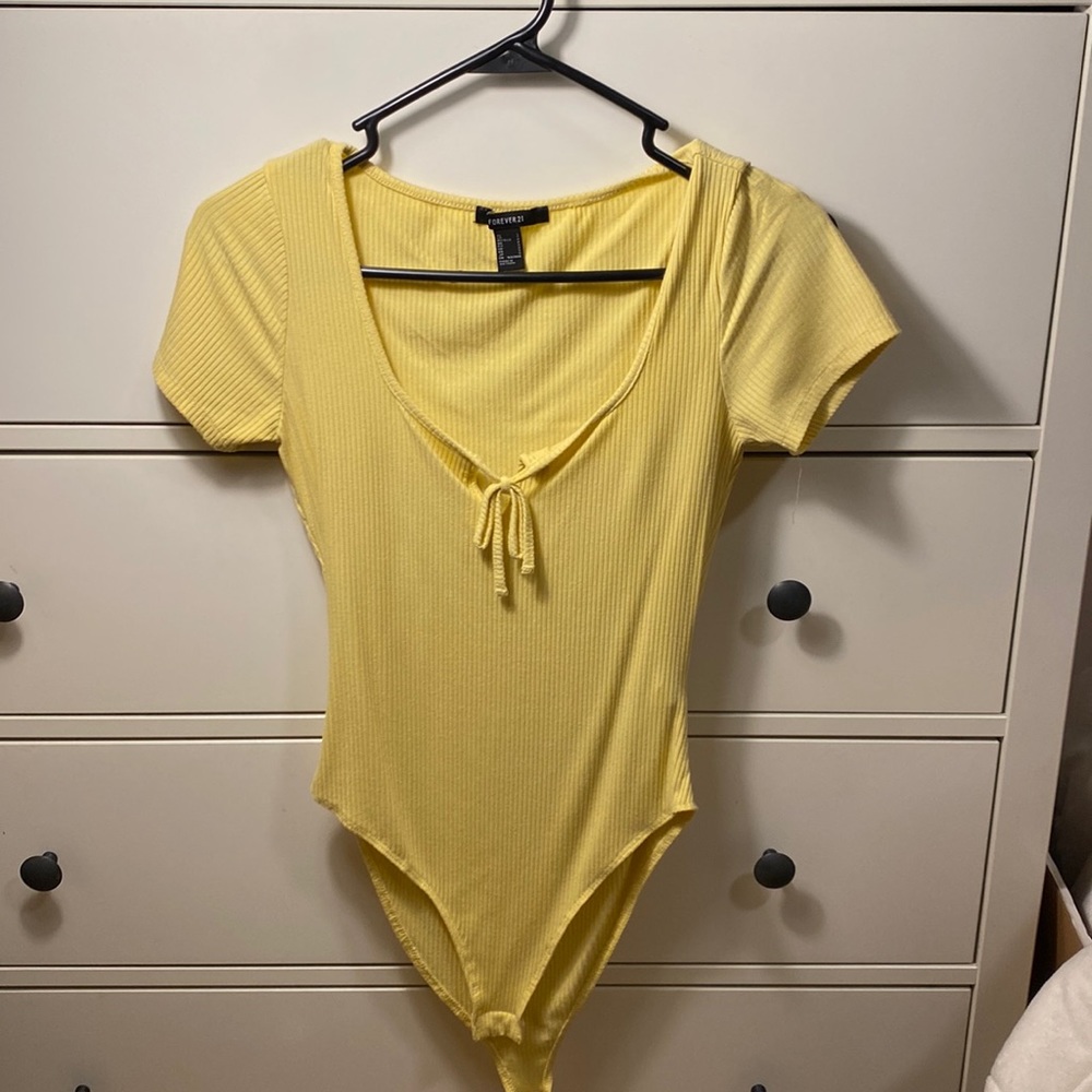 yellow bodysuit